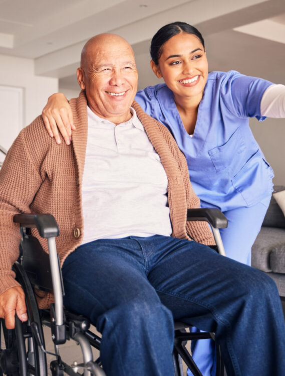 old-man-wheelchair-or-happy-caregiver-pointing-or-2023-11-27-05-27-51-utc Old man, wheelchair or happy caregiver pointing or talking with healthcare support at nursing home